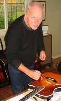 David Gilmour signs Taylor T5 Spruce Top
